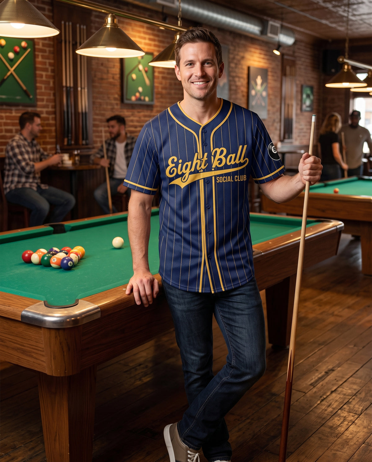 Man wearing the Eight Ball Social Club billiards baseball jersey in a pool hall